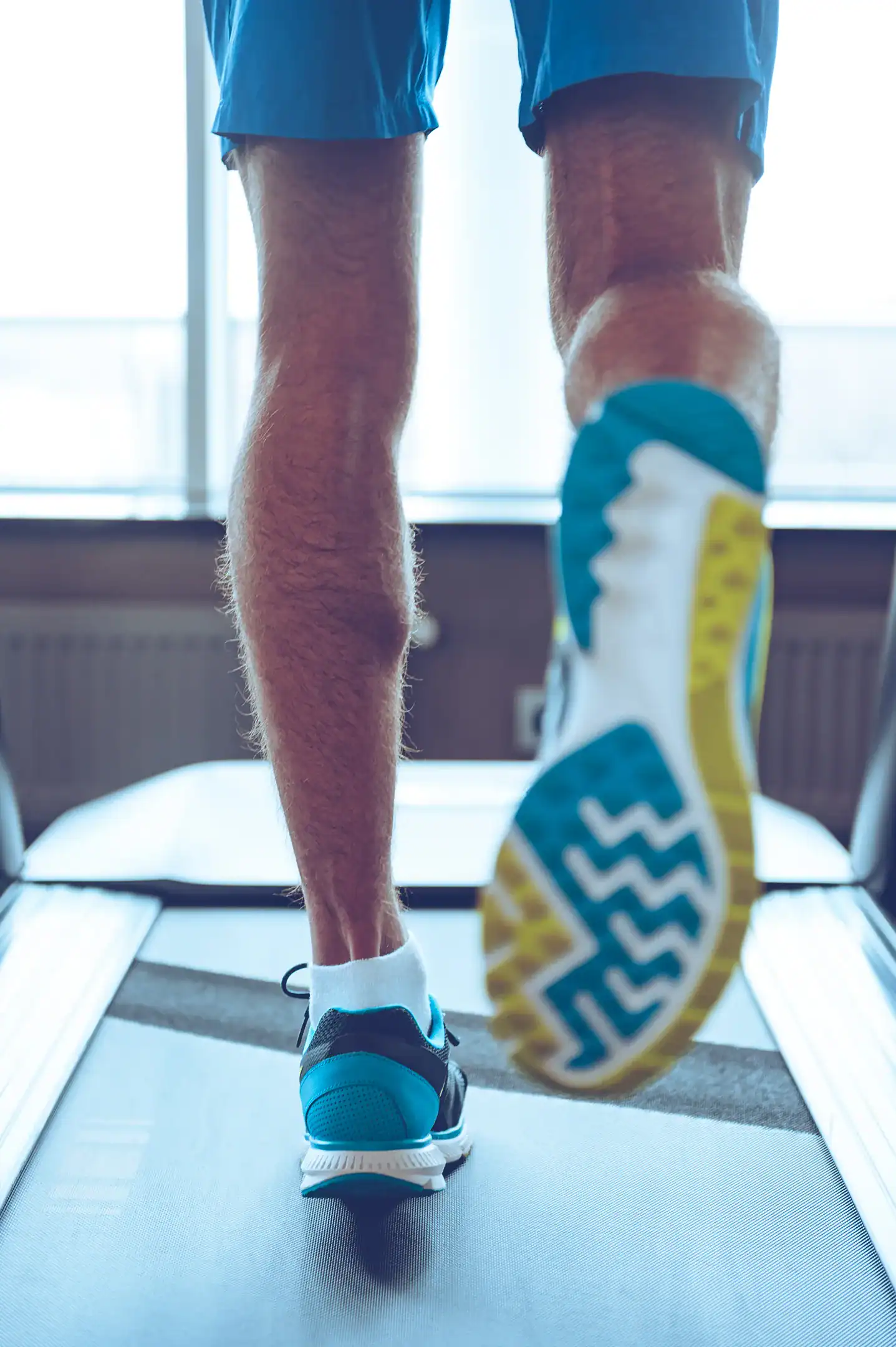 Gait Analysis: What It Is & Who Needs It 2 running fast close up part man sports shoes running treadmill gym